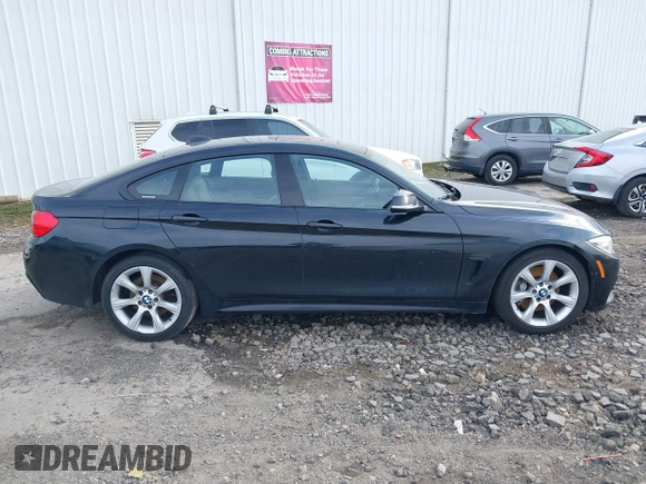 2016 BMW 4 Series 428i xDrive with VIN WBA4C9C52GG136584, listed as a IAAI auction lot 41530110 with 124,667 mi miles and . Bid and sale history available at carsss.com. Image 13.