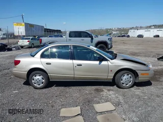 2002 Saturn SL with VIN 1G8ZH52812Z167587, listed as a IAAI auction lot 42000992 with 104,894 mi miles and . Bid and sale history available at DreamBid. Image 13.
