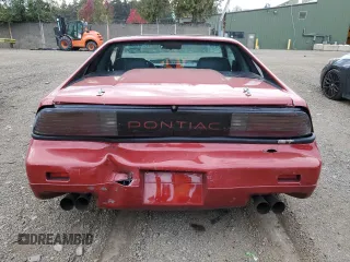 1987 Pontiac Fiero GT z VIN 1G2PG1199HP214795, wystawiony jako Copart lot #75901054 z przebiegiem 206 675 mil mil oraz Szkody całkowita. Historia ofert i sprzedaży dostępna na DreamBid. Obrazek 6.