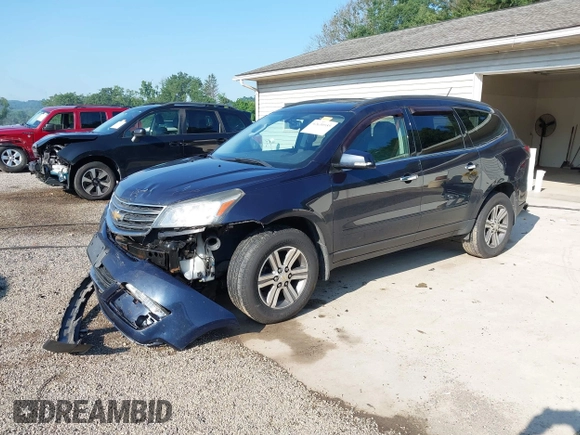 2015 Chevrolet Traverse LT with VIN 1GNKVHKD8FJ385472, listed as a IAAI auction lot 42630555 with 156,648 mi miles and . Bid and sale history available at DreamBid. Image 2.