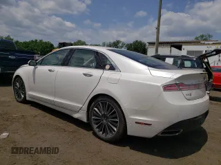 2016 Lincoln MKZ Hybrid с VIN 3LN6L2LU4GR620948, выставлен на аукционе Copart как лот 60905315 с пробегом 77 965 миль миль и Списание • Salvage title. История ставок и продаж доступна на DreamBid. Изображение 2.