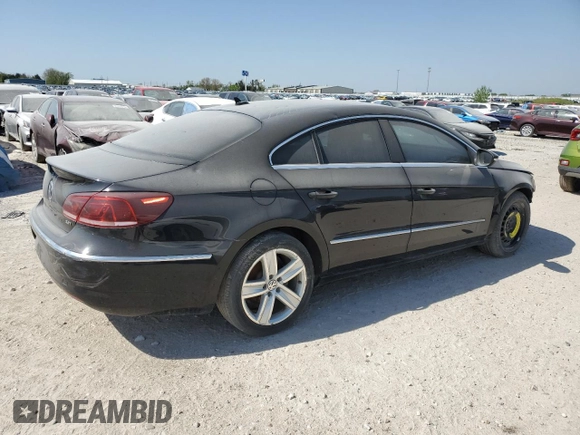 2014 Volkswagen CC Sport with VIN WVWBN7AN6EE529590, listed as a Copart auction lot 88780515 with 123,392 mi miles and Salvage Title. Bid and sale history available at DreamBid. Image 3.