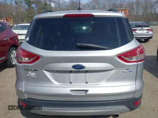 2016 Ford Escape SE with VIN 1FMCU9GXXGUB10447, listed as a IAAI auction lot 41879610 with 137,913 mi miles. Bid and sale history available at carsss.com. Image 16.