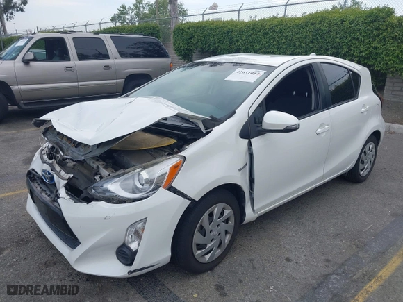 2015 Toyota Prius c One with VIN JTDKDTB3XF1097538, listed as a IAAI auction lot 42031057 with 100,847 mi miles. Bid and sale history available at carsss.com. Image 17.