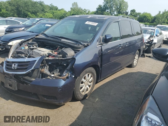 2010 Honda Odyssey EX-L z VIN 5FNRL3H73AB089714, wystawiony jako Copart lot #60276305 z przebiegiem 125 025 mil mil oraz Szkoda całkowita • Salvage title. Historia ofert i sprzedaży dostępna na DreamBid. Obrazek 1.