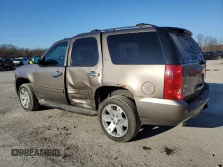 2012 GMC Yukon SLT with VIN 1GKS2CE05CR103674, listed as a Copart auction lot 50557275 with 206,664 mi miles and Salvage Title. Bid and sale history available at carsss.com. Image 2.
