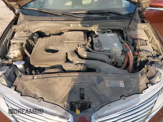 2016 Lincoln MKZ Hybrid with VIN 3LN6L2LU0GR630666, listed as a IAAI auction lot 40816259 with 139,399 mi miles. Bid and sale history available at carsss.com. Image 10.