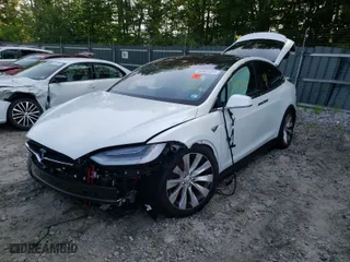 2020 Tesla Model X Long Range with VIN 5YJXCDE2XLF263903, listed as a Copart auction lot 52931311 with 0 mi miles and Salvage Title. Bid and sale history available at carsss.com. Image 2.