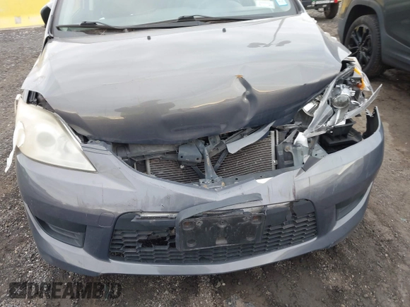 2010 Mazda 5 Sport with VIN JM1CR2WLXA0370650, listed as a IAAI auction lot 41602072 with 142,611 mi miles and . Bid and sale history available at DreamBid. Image 6.
