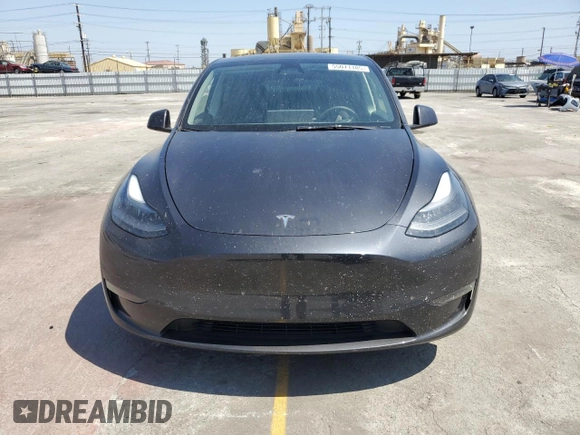 2024 Tesla Model Y Long Range z VIN 7SAYGDEE0RF062395, wystawiony jako Copart lot #55071185 z przebiegiem 42 747 mil mil oraz Szkoda całkowita • Salvage title. Historia ofert i sprzedaży dostępna na DreamBid. Obrazek 5.