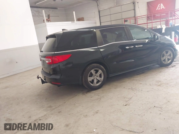 2018 Honda Odyssey EX-L with VIN 5FNRL6H78JB011284, listed as a IAAI auction lot 42000640 with 154,252 mi miles and . Bid and sale history available at DreamBid. Image 4.