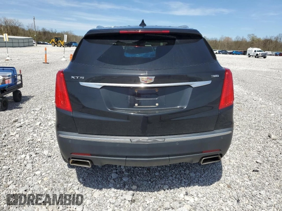 2017 Cadillac XT5 FWD with VIN 1GYKNARS2HZ131243, listed as a Copart auction lot 54189395 with 134,324 mi miles and Salvage Title. Bid and sale history available at DreamBid. Image 6.