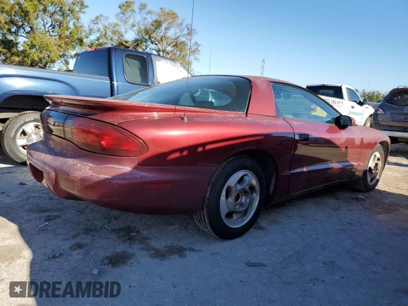 1995 Pontiac Firebird Firebird z VIN 2G2FS22S3S2240907, wystawiony jako Copart lot #77215444 z przebiegiem 111 636 mil mil oraz Szkoda całkowita • Salvage title. Historia ofert i sprzedaży dostępna na DreamBid. Obrazek 3.