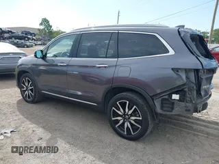 2022 Honda Pilot Elite with VIN 5FNYF6H04NB025212, listed as a IAAI auction lot 42430032 with 69,427 mi miles and . Bid and sale history available at DreamBid. Image 3.