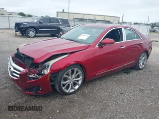 2014 Cadillac ATS Premium z VIN 1G6AE5S33E0125546, wystawiony jako IAAI lot #41989269 z przebiegiem 55 945 mil mil oraz . Historia ofert i sprzedaży dostępna na DreamBid. Obrazek 2.