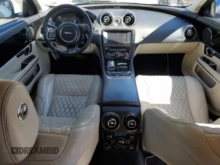 2016 Jaguar XJ Portfolio with VIN SAJWA2G70G8W01136, listed as a Copart auction lot 50120455 with 92,224 mi miles and Salvage title. Bid and sale history available at DreamBid. Image 8.