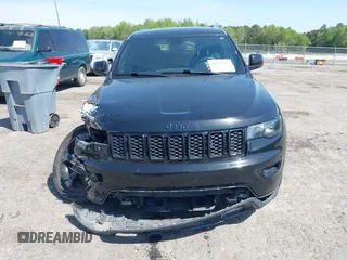2019 Jeep Grand Cherokee Altitude with VIN 1C4RJFAG8KC808309, listed as a IAAI auction lot 41977457 with 122,923 mi miles and . Bid and sale history available at DreamBid. Image 12.