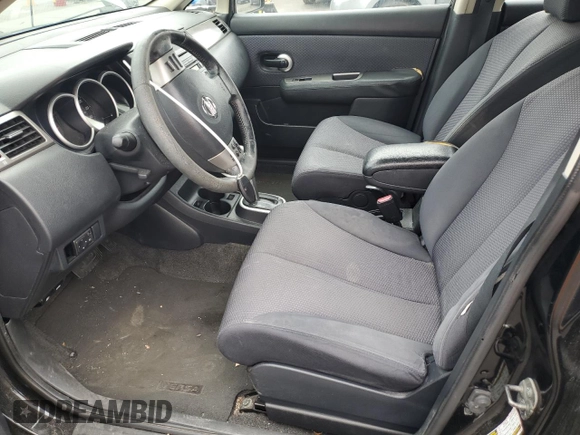2009 Nissan Versa S with VIN 3N1BC13E99L418721, listed as a Copart auction lot 54268065 with 196,206 mi miles and Clean Title. Bid and sale history available at DreamBid. Image 7.