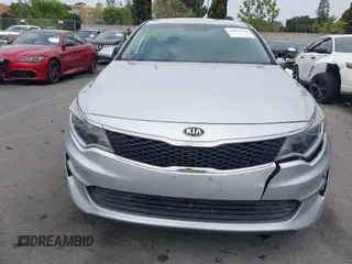 2016 Kia Optima LX with VIN 5XXGT4L34GG023812, listed as a IAAI auction lot 42034160 with 96,720 mi miles and . Bid and sale history available at DreamBid. Image 12.