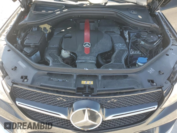 2016 Mercedes-Benz GLE 450 AMG z VIN 4JGED6EB9GA021162, wystawiony jako Copart lot #54714505 z przebiegiem 105 000 mil mil oraz Szkoda całkowita • Salvage title. Historia ofert i sprzedaży dostępna na DreamBid. Obrazek 14.