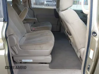 2007 Kia Sedona LX with VIN KNDMB233676171551, listed as a IAAI auction lot 40801032 with 142,581 mi miles. Bid and sale history available at carsss.com. Image 8.