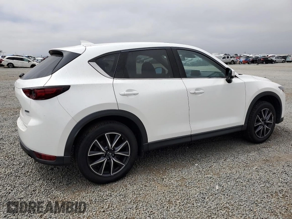 2018 Mazda CX-5 Grand Touring with VIN JM3KFADMXJ1358221, listed as a Copart auction lot 59746545 with 54,094 mi miles and Salvage title. Bid and sale history available at DreamBid. Image 3.