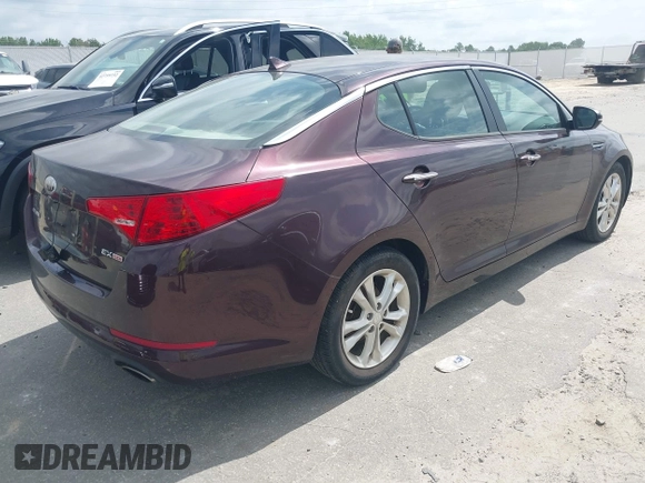 2013 Kia Optima EX with VIN 5XXGN4A7XDG177274, listed as a IAAI auction lot 42759090 with 164,212 mi miles and . Bid and sale history available at DreamBid. Image 4.