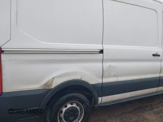 2018 Ford Transit with VIN 1FTYE1CM1JKA35810, listed as a IAAI auction lot 42178750 with 254,654 mi miles and . Bid and sale history available at DreamBid. Image 6.