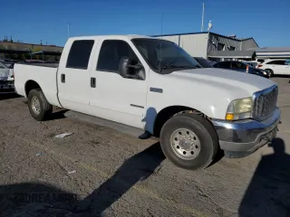 2002 Ford F-250 XL with VIN 1FTNW20F22ED02464, listed as a Copart auction lot 55028785 with Not provided miles and Salvage title. Bid and sale history available at DreamBid. Image 4.