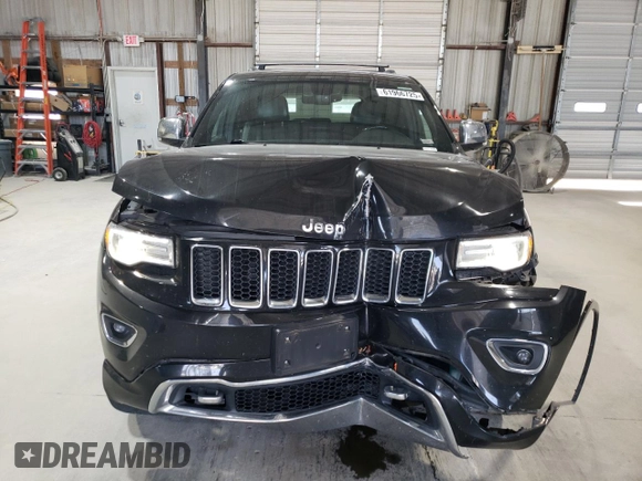 2015 Jeep Grand Cherokee Overland with VIN 1C4RJFCG0FC783375, listed as a Copart auction lot 61966725 with 191,478 mi miles and Salvage title. Bid and sale history available at DreamBid. Image 5.