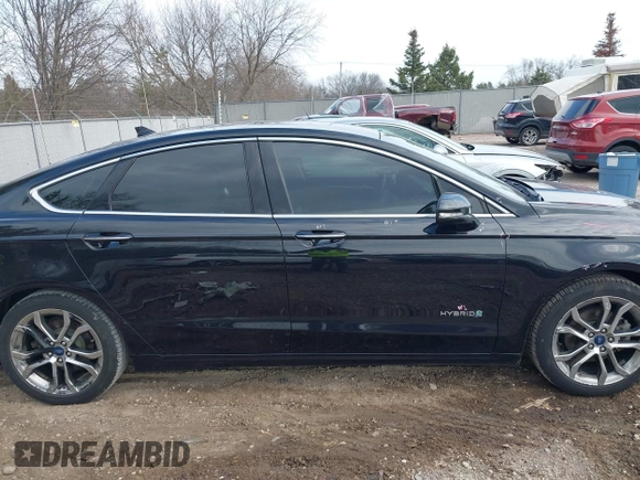 2019 Ford Fusion Hybrid Titanium with VIN 3FA6P0RU4KR144445, listed as a IAAI auction lot 42059840 with 90,617 mi miles. Bid and sale history available at carsss.com. Image 14.