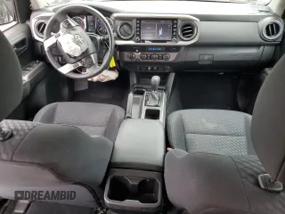 2021 Toyota Tacoma SR z VIN 3TYCZ5AN3MT046066, wystawiony jako Copart lot #54785665 z przebiegiem 57 897 mil mil oraz Szkoda całkowita • Salvage title. Historia ofert i sprzedaży dostępna na DreamBid. Obrazek 8.
