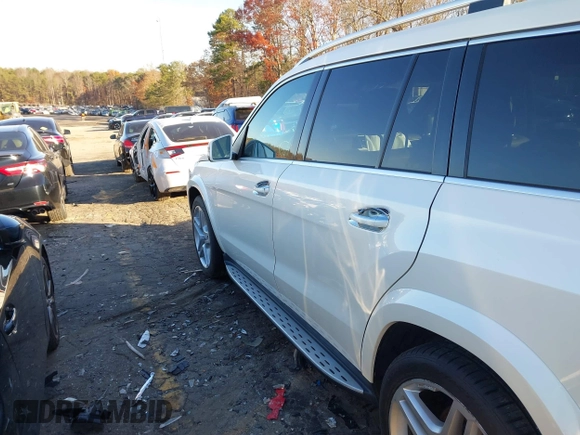 2016 Mercedes-Benz GL with VIN 4JGDF7DE6GA703049, listed as a IAAI auction lot 41063570 with 116,736 mi miles. Bid and sale history available at carsss.com. Image 14.