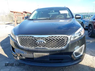 2018 Kia Sorento LX z VIN 5XYPG4A39JG385905, wystawiony jako IAAI lot #40936433 z przebiegiem 116 080 mil mil oraz . Historia ofert i sprzedaży dostępna na DreamBid. Obrazek 12.
