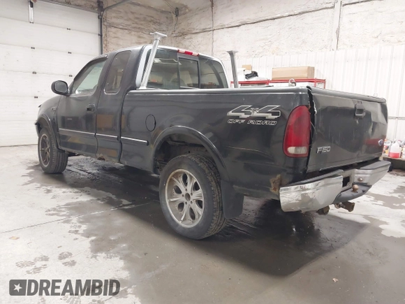 1997 Ford F-150 XL with VIN 1FTDX18W6VNB19712, listed as a IAAI auction lot 41740832 with 232,275 mi miles. Bid and sale history available at carsss.com. Image 3.