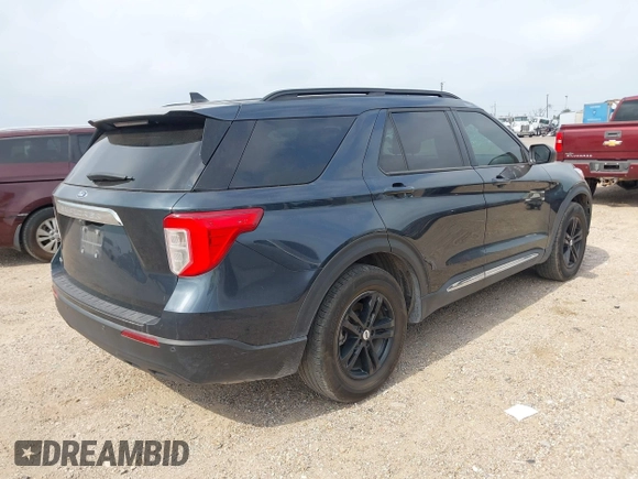 2023 Ford Explorer XLT with VIN 1FMSK7DH9PGB87649, listed as a IAAI auction lot 42271454 with 26,860 mi miles and . Bid and sale history available at DreamBid. Image 4.