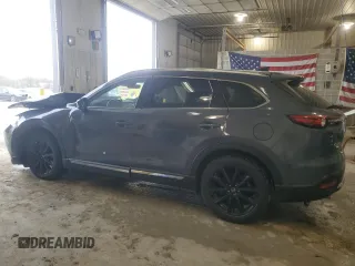 2021 Mazda CX-9 Grand Touring z VIN JM3TCBDYXM0516394, wystawiony jako Copart lot #52505215 z przebiegiem Nie podano mil oraz Szkoda całkowita • Salvage title. Historia ofert i sprzedaży dostępna na DreamBid. Obrazek 2.