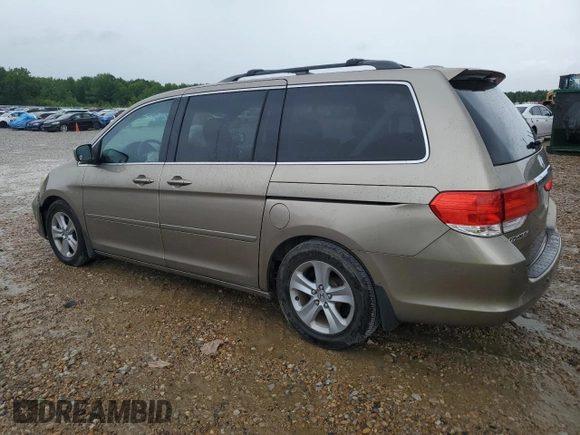 2010 Honda Odyssey Touring z VIN 5FNRL3H97AB082525, wystawiony jako Copart lot #56410845 z przebiegiem 94 819 mil mil oraz Szkoda całkowita • Salvage title. Historia ofert i sprzedaży dostępna na DreamBid. Obrazek 2.