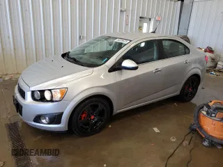 2014 Chevrolet Sonic LTZ z VIN 1G1JE5SB9E4200899, wystawiony jako Copart lot #56039625 z przebiegiem 98 102 mil mil oraz Nie do naprawy • Non repairable. Historia ofert i sprzedaży dostępna na DreamBid. Obrazek 1.