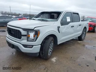 2023 Ford F-150 XL with VIN 1FTEW1C50PKF33143, listed as a IAAI auction lot 41549135 with 9,744 mi miles. Bid and sale history available at carsss.com. Image 2.