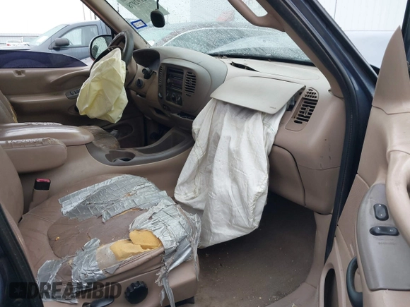 1998 Ford Expedition XLT z VIN 1FMPU18L4WLB36920, wystawiony jako IAAI lot #42192978 z przebiegiem Nie podano mil oraz . Historia ofert i sprzedaży dostępna na DreamBid. Obrazek 5.