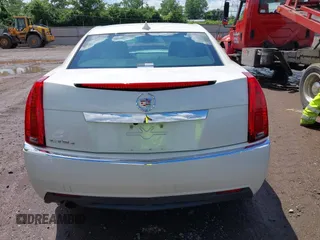 2012 Cadillac CTS Luxury with VIN 1G6DG5E57C0137409, listed as a IAAI auction lot 42633890 with 86,886 mi miles and . Bid and sale history available at DreamBid. Image 16.