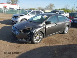 2016 Ford Focus SE with VIN 1FADP3F2XGL207906, listed as a IAAI auction lot 42099203 with 95,527 mi miles. Bid and sale history available at carsss.com. Image 2.