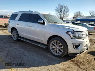 2019 Ford Expedition Platinum with VIN 1FMJU1MT4KEA62215, listed as a Copart auction lot 84104024 with 102,153 mi miles and Salvage Title. Bid and sale history available at carsss.com. Image 4.