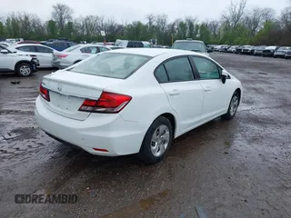 2015 Honda Civic LX with VIN 19XFB2F54FE104574, listed as a IAAI auction lot 42096001 with 122,094 mi miles and . Bid and sale history available at DreamBid. Image 4.