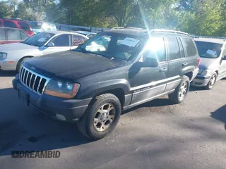 1999 Jeep Grand Cherokee Laredo with VIN 1J4GW58S0XC538913, listed as a IAAI auction lot 42684467 with 241,252 mi miles and . Bid and sale history available at DreamBid. Image 2.