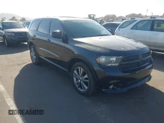 2013 Dodge Durango SXT with VIN 1C4RDHAG9DC686131, listed as a IAAI auction lot 41272891 with 122,089 mi miles and . Bid and sale history available at DreamBid. Image 1.