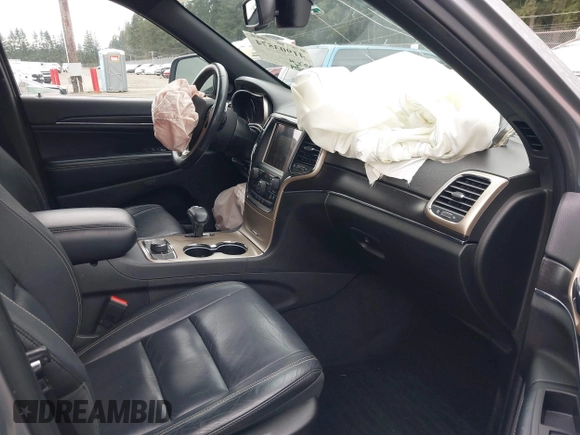 2014 Jeep Grand Cherokee Limited z VIN 1C4RJFBG8EC541921, wystawiony jako IAAI lot #41903574 z przebiegiem 133 679 mil mil oraz . Historia ofert i sprzedaży dostępna na DreamBid. Obrazek 5.