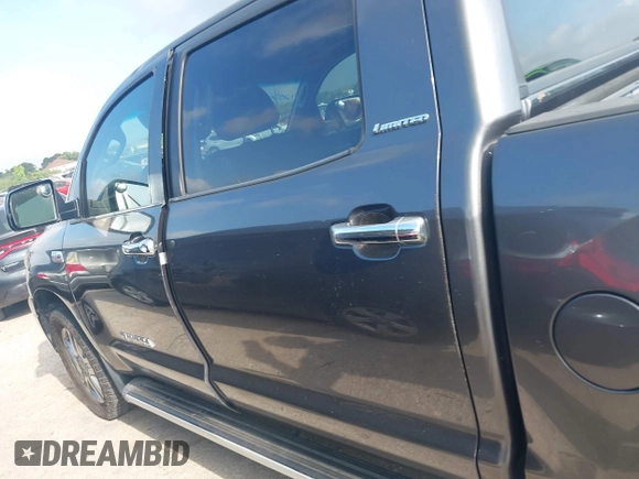 2011 Toyota Tundra Limited with VIN 5TFFY5F16BX107242, listed as a IAAI auction lot 42079406 with 201,000 mi miles and . Bid and sale history available at DreamBid. Image 14.