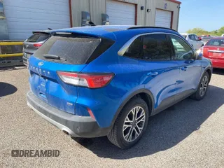 2021 Ford Escape SEL Hybrid with VIN 1FMCU0CZ9MUA50773, listed as a IAAI auction lot 42082439 with 71,191 mi miles and . Bid and sale history available at DreamBid. Image 1.